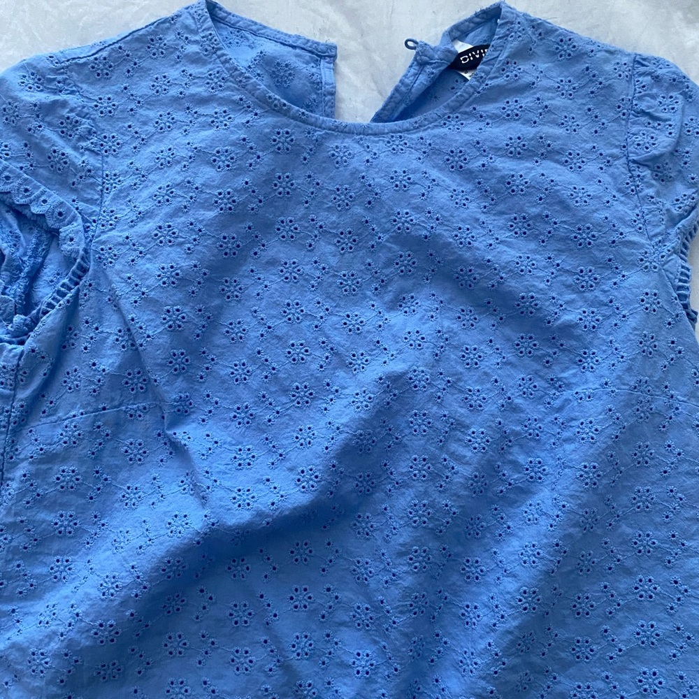 Light blue top